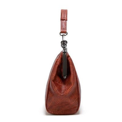 Vintage kiss lock handbag