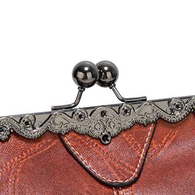 Vintage kiss lock handbag
