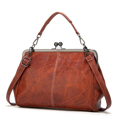 Vintage kiss lock handbag