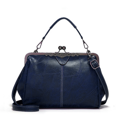 Vintage kiss lock handbag
