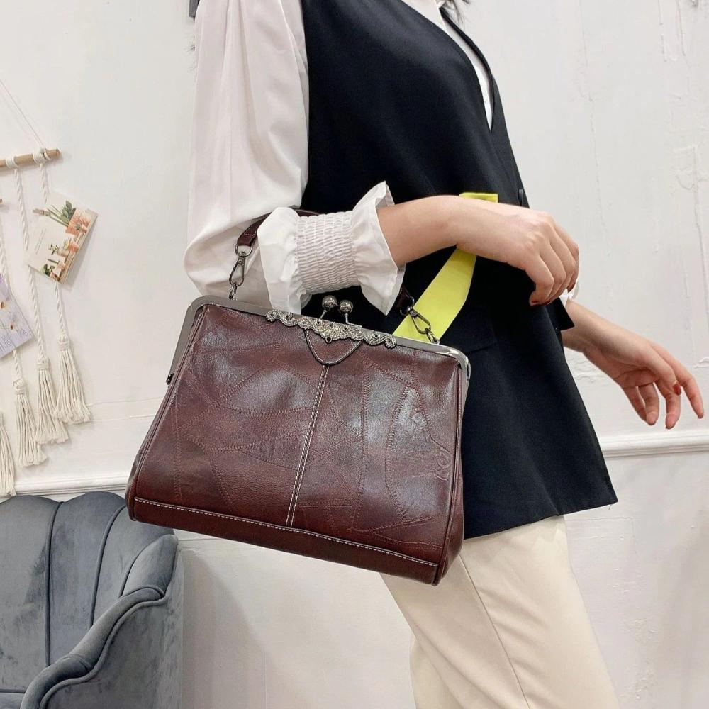 Vintage kiss lock handbag