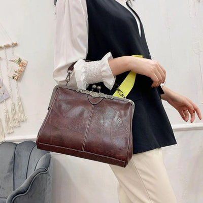 Vintage kiss lock handbag