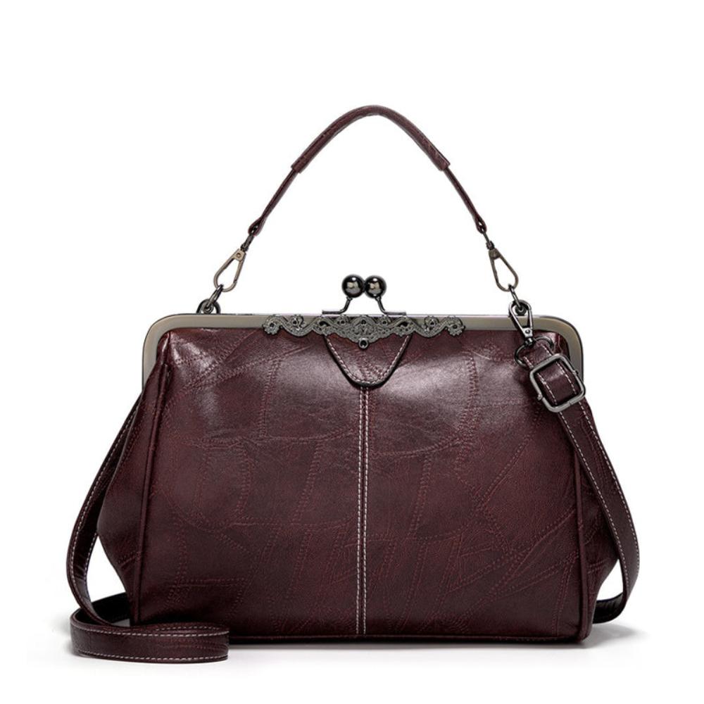 Vintage kiss lock handbag