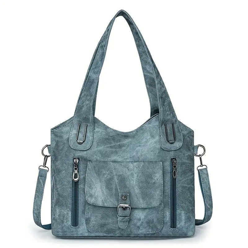 Emilia’s spacious retro-style shoulder bag