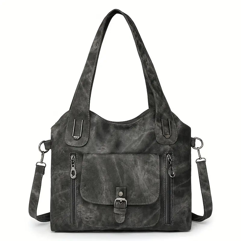 Emilia’s spacious retro-style shoulder bag