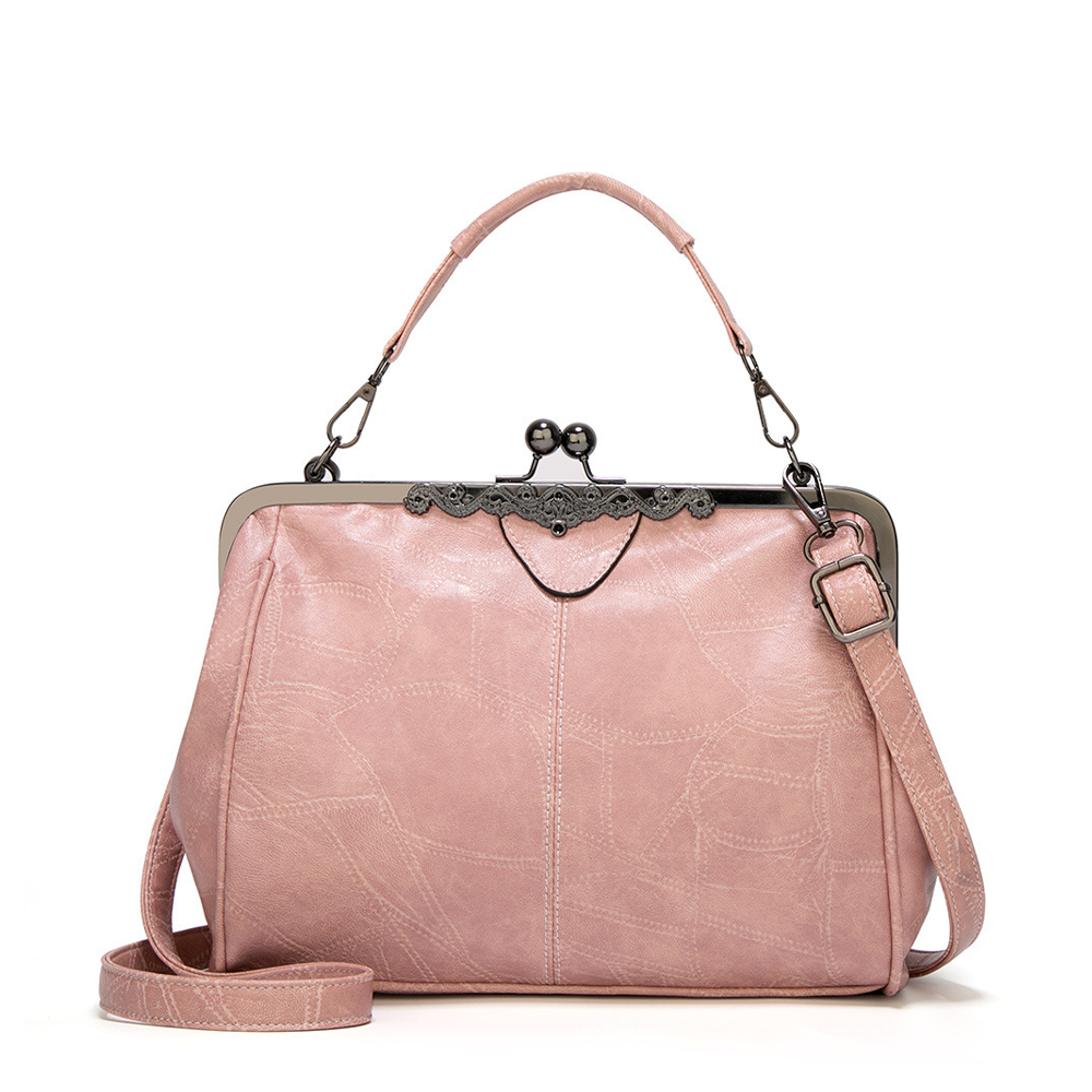 Vintage kiss lock handbag