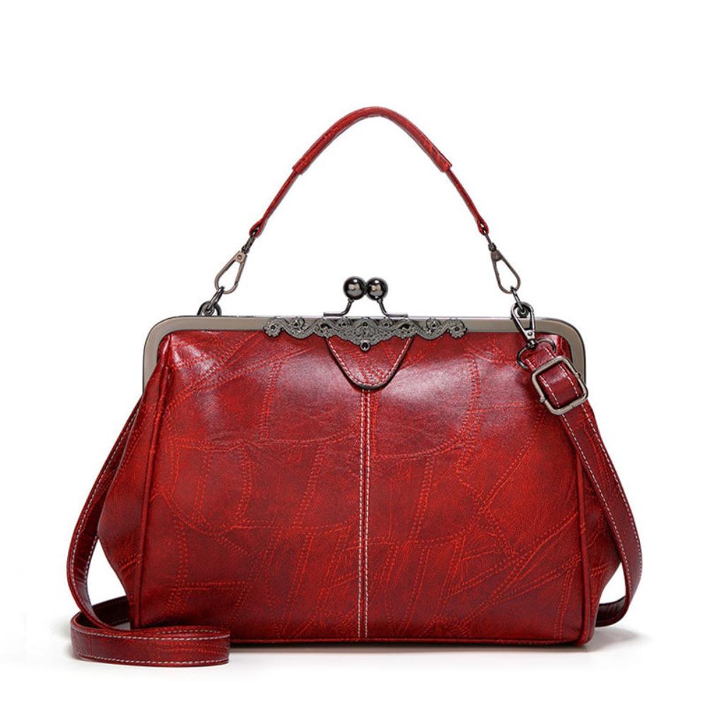 Vintage kiss lock handbag