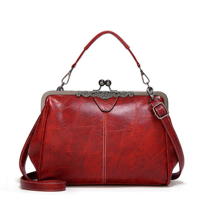 Vintage kiss lock handbag